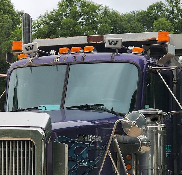 Western Star dump truck cab windshield replaced on site rather than in a glass shop